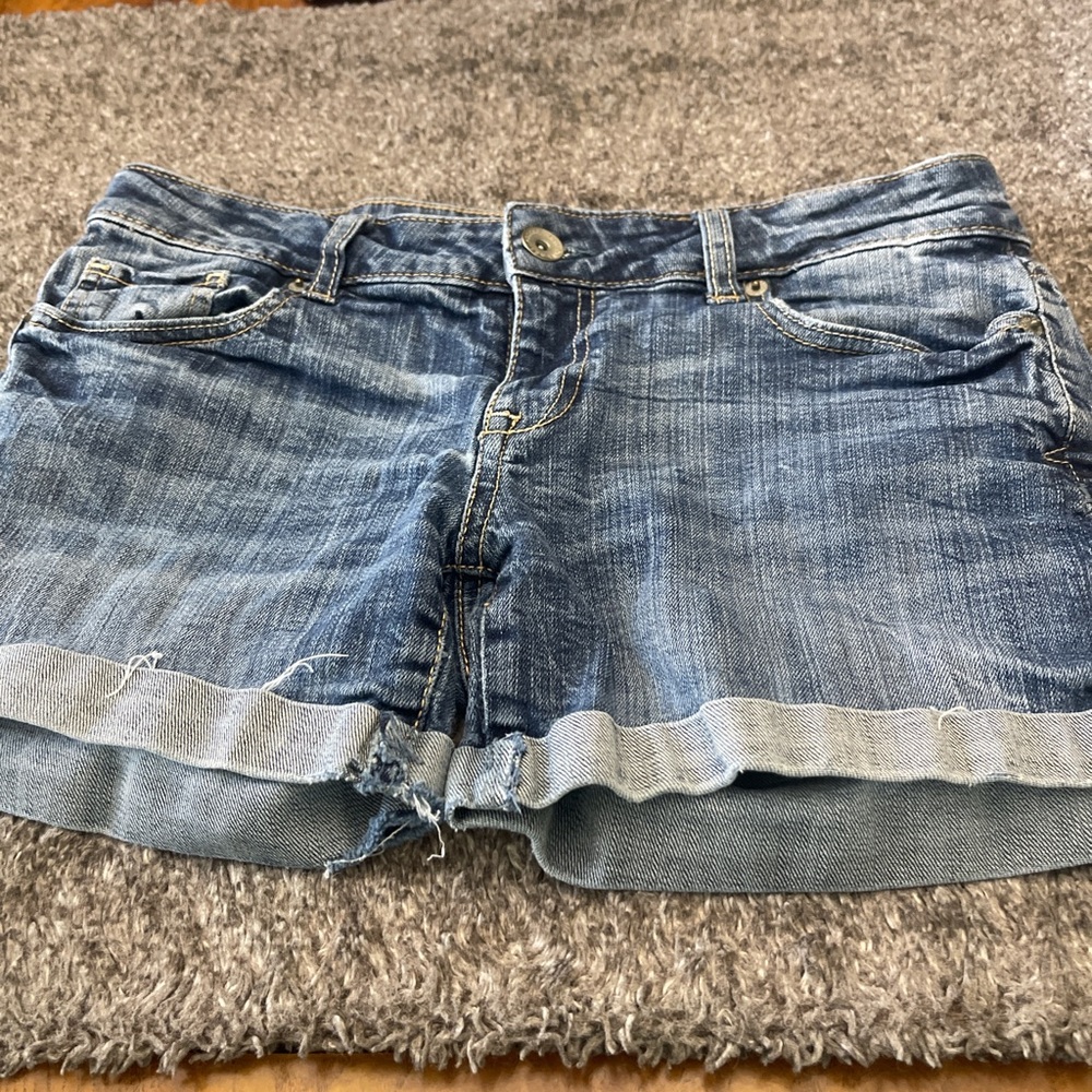 Blue Jean shorts with baseball pockets.